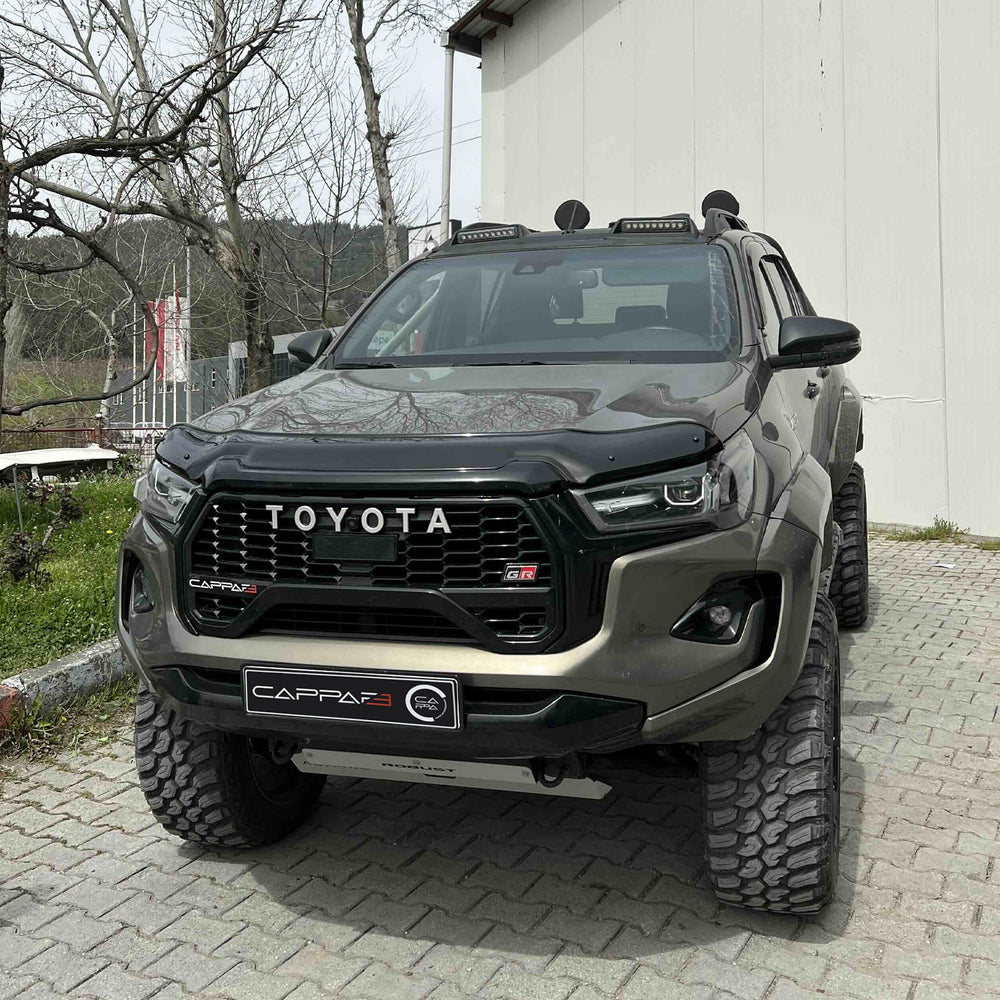 
                  
                    Front Hood Protection Spoiler & Bug Shield for Toyota Hilux (2020–2025) – Durable Hood Deflector Guard
                  
                
