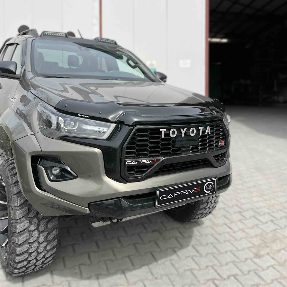 
                  
                    Front Hood Protection Spoiler & Bug Shield for Toyota Hilux (2020–2025) – Durable Hood Deflector Guard
                  
                