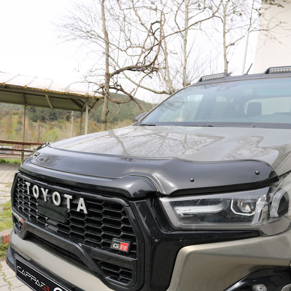 
                  
                    Front Hood Protection Spoiler & Bug Shield for Toyota Hilux (2020–2025) – Durable Hood Deflector Guard
                  
                