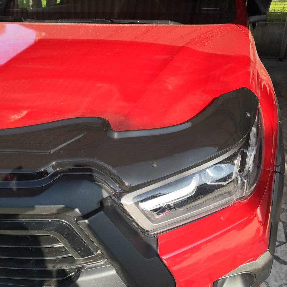 
                  
                    Front Hood Bug Shield & Deflector Guard for Toyota Hilux (2021–2026) – Tough & Sleek Hood Protection Spoiler
                  
                