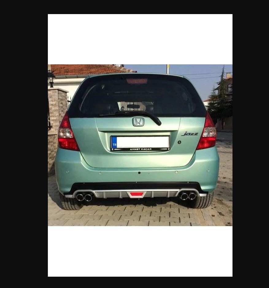 
                  
                    Aggressive Rear Diffuser with 4 Exhaust Tips for Honda Jazz (2003–2020) – Sport Look & Easy Fitment
                  
                